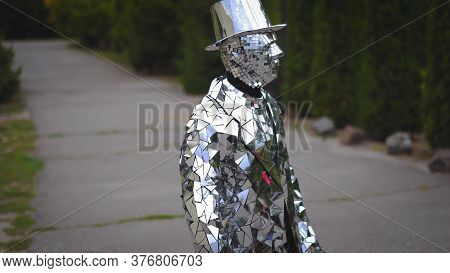 Show Man In Mirror Suit And Hat Standing Without Any Motion Like Statue. Side Shot Photo. Ukraine- K