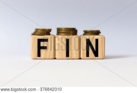 Cubes With The Word Fin On Them. Care Concept.