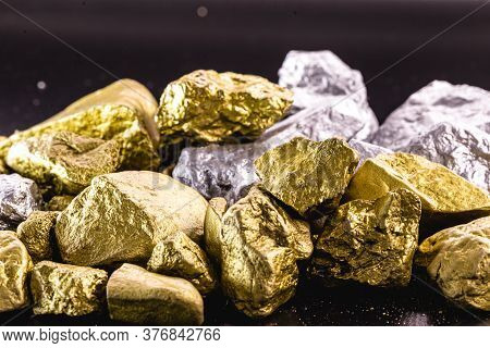 Nuggets Of Gold And Silver Piled Up, Precious Stones Used In The Industry And Jewelry. Concept Of El