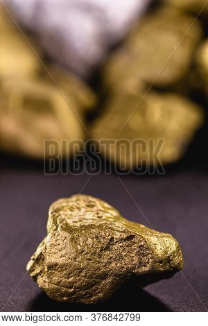 Rough Gold Stones, Precious Nuggets Isolated On Black Background.