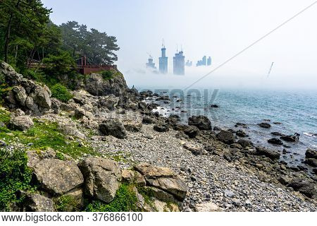 Busan,south Korea - July 20, 2017:  The Wooden Suspension Bridge On The Rock Cilff In Haeundae Dongb