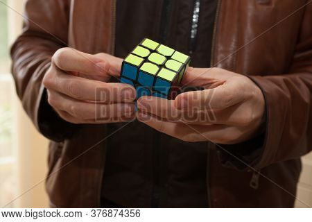A Man Completing A Rubix Cube, Taken 3rd March 2020 In Burford In The Uk