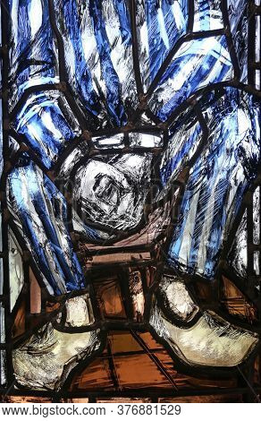 PIFLAS, GERMANY - JUNE 07, 2015: Saint Maximilian Kolbe, detail of stained glass window by Sieger Koder in St. John church in Piflas, Germany