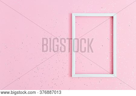Birthday Or Holiday Mockup With Frame, On Pink Paper Background Covered With Sequins With Copy Space