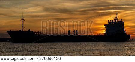 Sunset Over The Ship - Seascape In A Romantic Evening