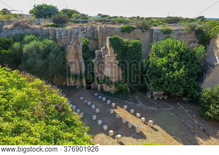 Lithica Stone Quarry On Balearic Islands. Spain. Old Stone-pit On Menorca. Ancient Quarry On The Isl