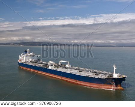 Drone Photo Of A Suezmax Tanker At Anchor In Cloudy Weather Off The Coast Of England