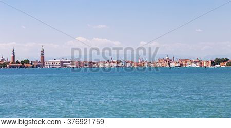 Panoramic View From The Canal To Venice, Italy. Doge's Palace, Campanile Of The Cathedral Of St. Mar
