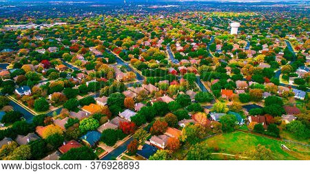 Colorful Rooftops And Fall Landscape Aerial Drone Views Above Thousands Of Homes And Houses In Subur