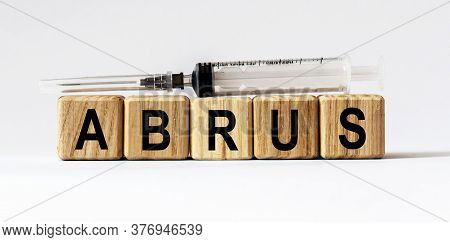 Text Abrus Made From Wooden Cubes. White Background