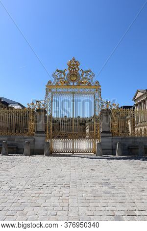 The Gates Of The Cour D'honneur Of The Palace Of Versailles