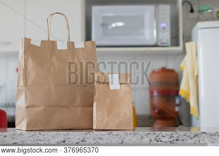 Delivery Home Food App Concept Image With Paper Bag. Space For Text Or Logo.