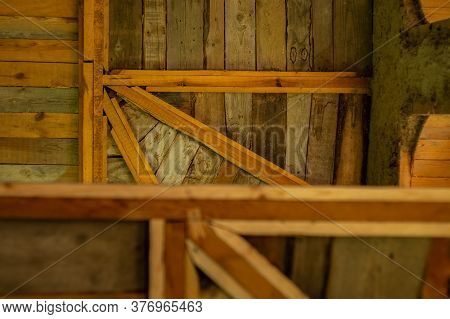 Structures Of A Wooden Ecohouse With Clay Plaster. Bottom View