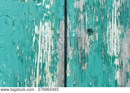 Old Rustic Painted Cracky Green, Turquoise Wooden Texture Or Background.