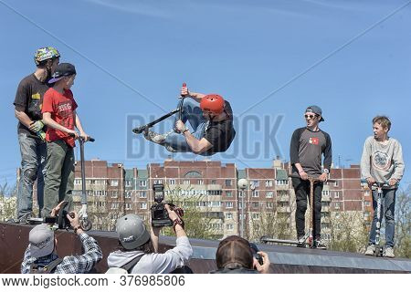 Russia, St. Petersburg, 10,05,2015.boy On Scooter Flips In The Air, The Youth Festival Of Extreme Sp