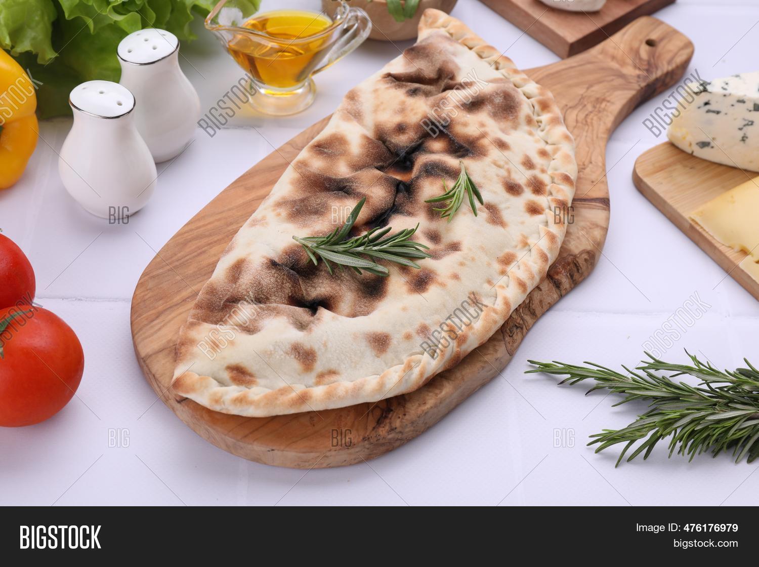 Tasty Pizza Calzone Image & Photo (Free Trial) | Bigstock