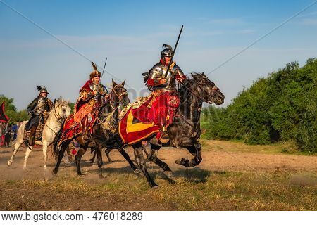 Gniew, Poland, Aug 2020 Castellan And His Hussars, Heavy Cavalry, Galloping With Swords Out. Histori