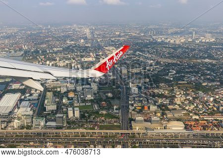 Bangkok Thailand - March 28, 2019: Airasia (a Popular Low-cost Airline)'s Aircraft Wing Just Took Of