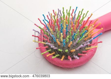 A Multicolored Comb With Fallen Hair. Hair Care. Problems, Hair Loss. Trichologist, Hair Care Proced