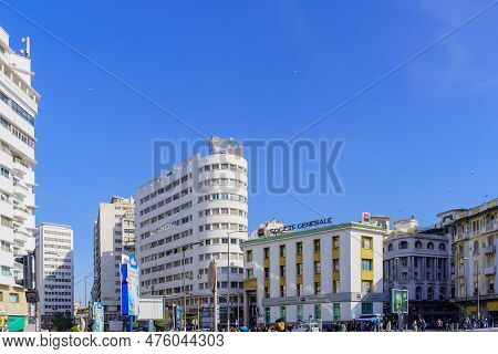 Casablanca, Morocco - March 29, 2023: Street View With Various White Buildings And Pedestrians, In C