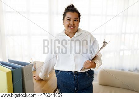 Obese Young Mixed Race Lady Family Counselor Working At Office