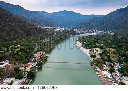 Aerial Drone Shot Of Blue Water Of River Ganga Stretching Into Distance With Himalayas With Ram Setu