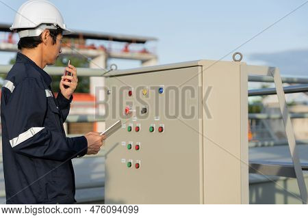 Mechanic Or Maintenance Or Electrical Engineer Checking Main Electrical Control Systems Industrial P
