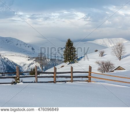 Winter  Morning Scenery Picturesque Mountain Hill Top With Farmstead Snow Covered (ukraine, Carpathi