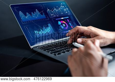 Analyst Working In Business Analytics And Data Management System To Make Report With Kpi And Metrics