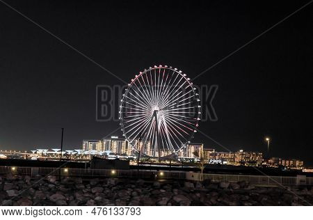 Dubai, United Arab Emirates, March 16, 2023 : Night View Of The Decoratively Illuminated Ferris Whee