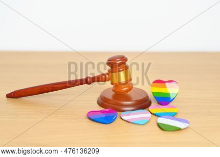Lgbt Law And Pride Month Concepts. Gavel Justice Hammer With Rainbow Colorful Heart Shape For Lesbia