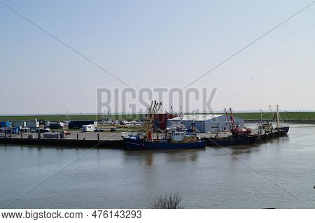 Buesum Is A Village At The German Northern Sea With Harbor And Lighthouse