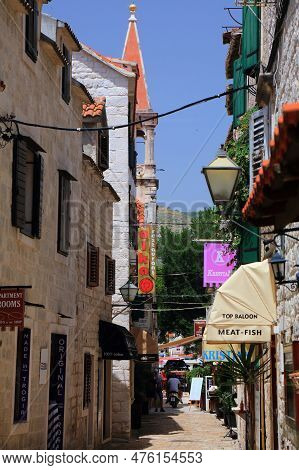Trogir, Croatia - June 23, 2021: Tourists Visit Old Town Of Trogir, Croatia. Trogir Is A Medieval To