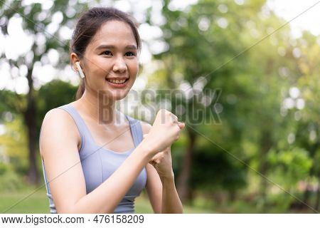 Fitness Asian Girl In Tight Sportswear Doing Exercises And Punching Boxing Footwork Cardio Exercise 