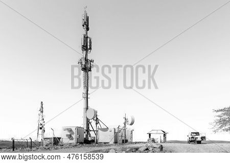 Keimoes, South Africa - Feb 24, 2023: A Cell Phone Base Station And A Viewpoint On Tierberg  In Keim