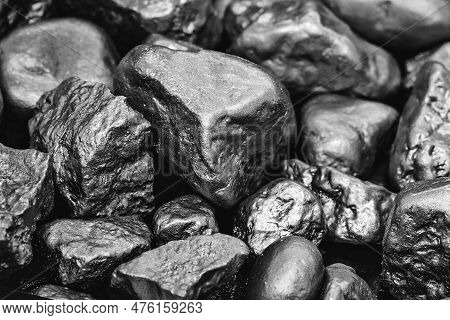 Golden Nuggets Isolated On Black Background. Luxury Concept And Gold.