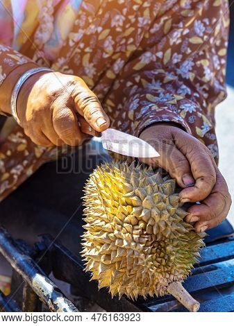 Elderly Thai Female Vendor Ride Motorcycle Selling Durians And Fruits And Vegetables To Tourists At