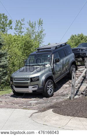Indianapolis - Circa May 2023: Land Rover Defender Display At A Dealership. Land Rover Offers The De