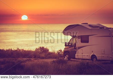 Caravan On Sea At Sunrise.