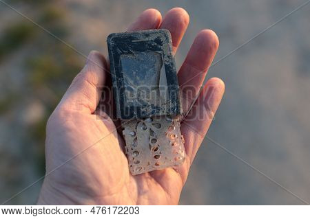 In Hand Damaged Old Phone - Challenge With Electronic Waste Recycling.