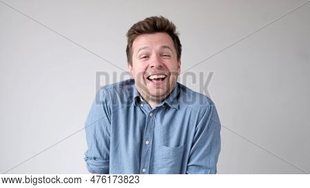 European Funny Young Man Is Laughing Loudly. Positive Emotion