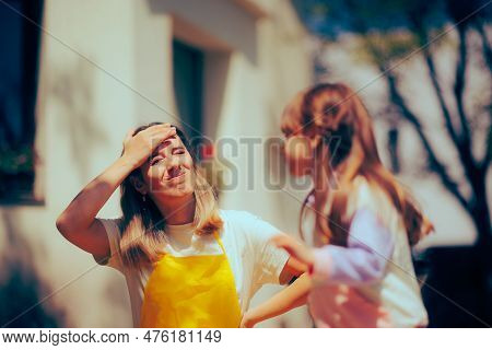 Mother Feeling Exasperated By Her Hyperactive Toddler Running Around