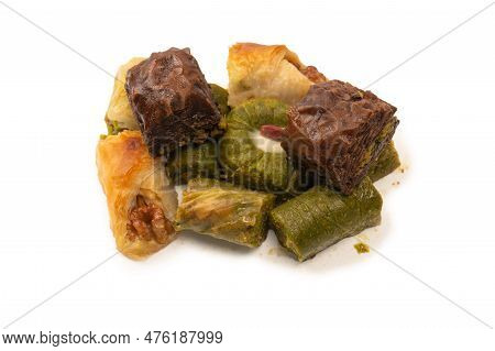 Turkish Pistachio Baklava Isolated On A White Background. A Variety Of Turkish Sweet Baklava. Walnut