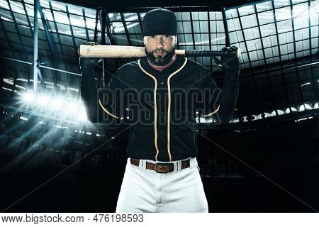 Porfessional Baseball Player With Bat On Grand Arena. Ballplayer On Stadium.