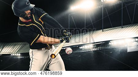 Porfessional Baseball Player With Bat Taking A Swing On Grand Arena. Ballplayer On Stadium In Action