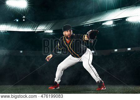 Porfessional Baseball Player On Grand Arena. Ballplayer On Stadium In Action.