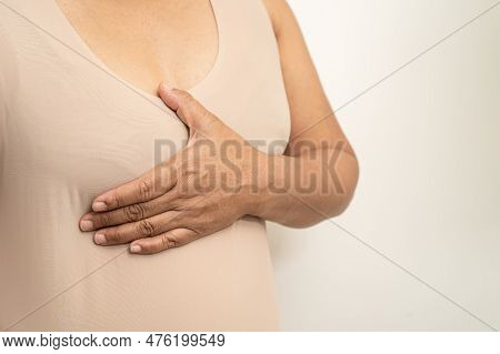 Asian Woman Patient Checking And Worry Her Breast, Breast Self Exam Or Bes, Symbol Of World Breast C