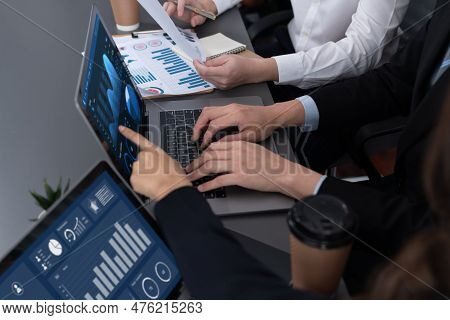 Business Team Analyze Business Analytic Or Business Intelligence Dashboard On Laptop Screen Show Gra