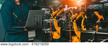 Engineer Use Advanced Robotic Software To Control Industry Robot Arm In Factory . Automation Manufac