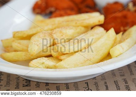 Chicken Nuggets With French Fries And Sauce